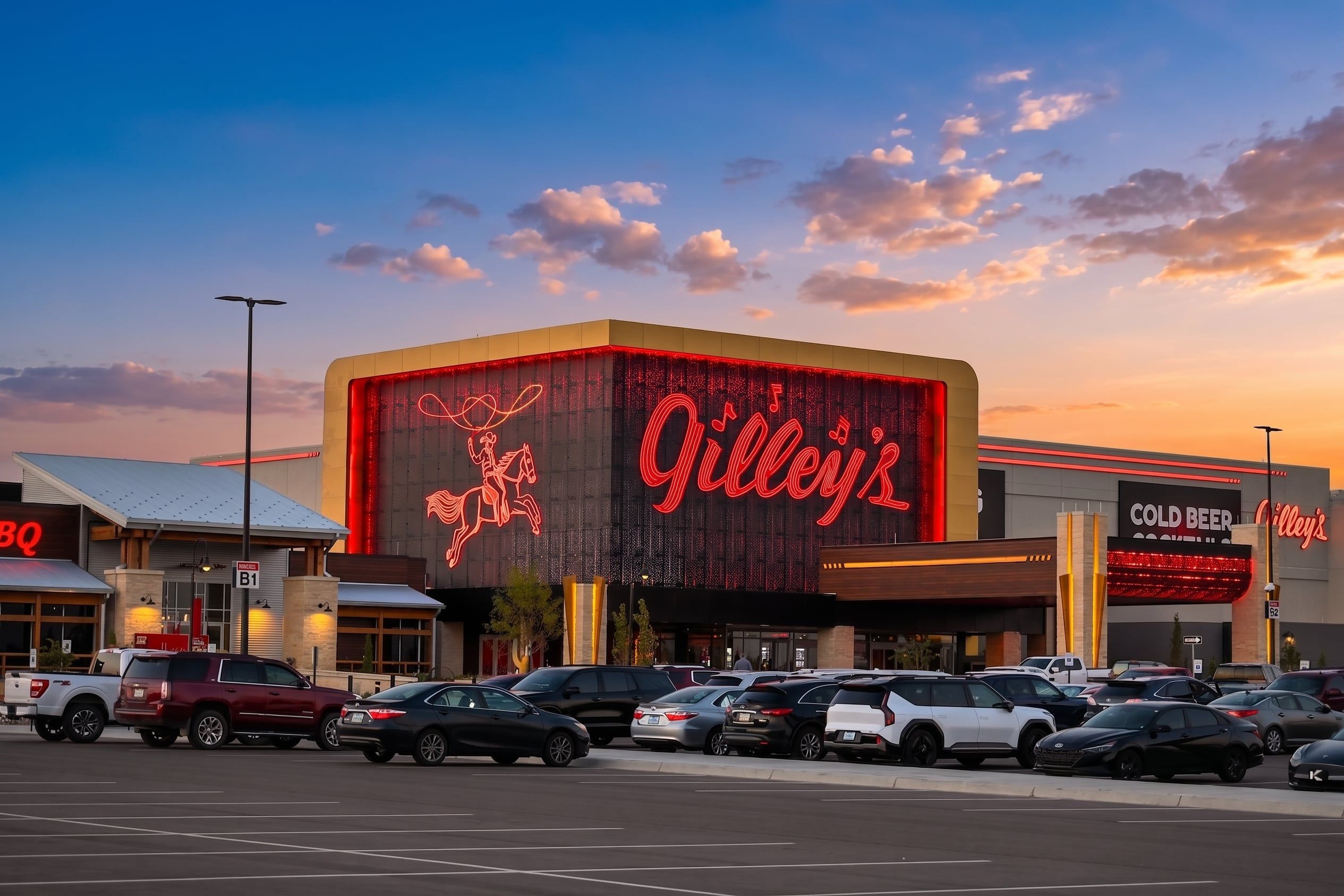 The illuminated Gilley's sign at dusk in Park City